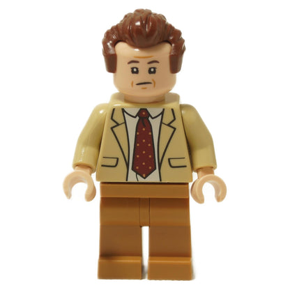 LEGO minifigure of Toby Flenderson from The Office, wearing a tan suit and maroon polka-dot tie.