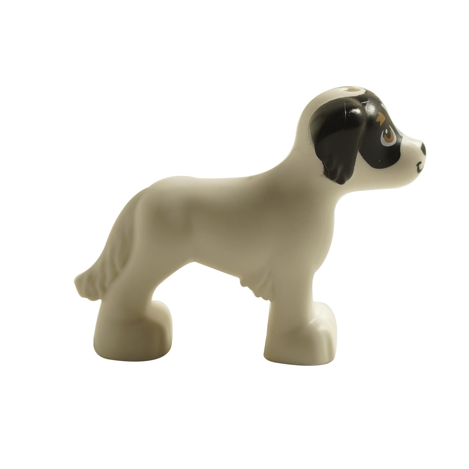 LEGO® Friends shaggy dog figure in white with black ear and eye patch print, side view