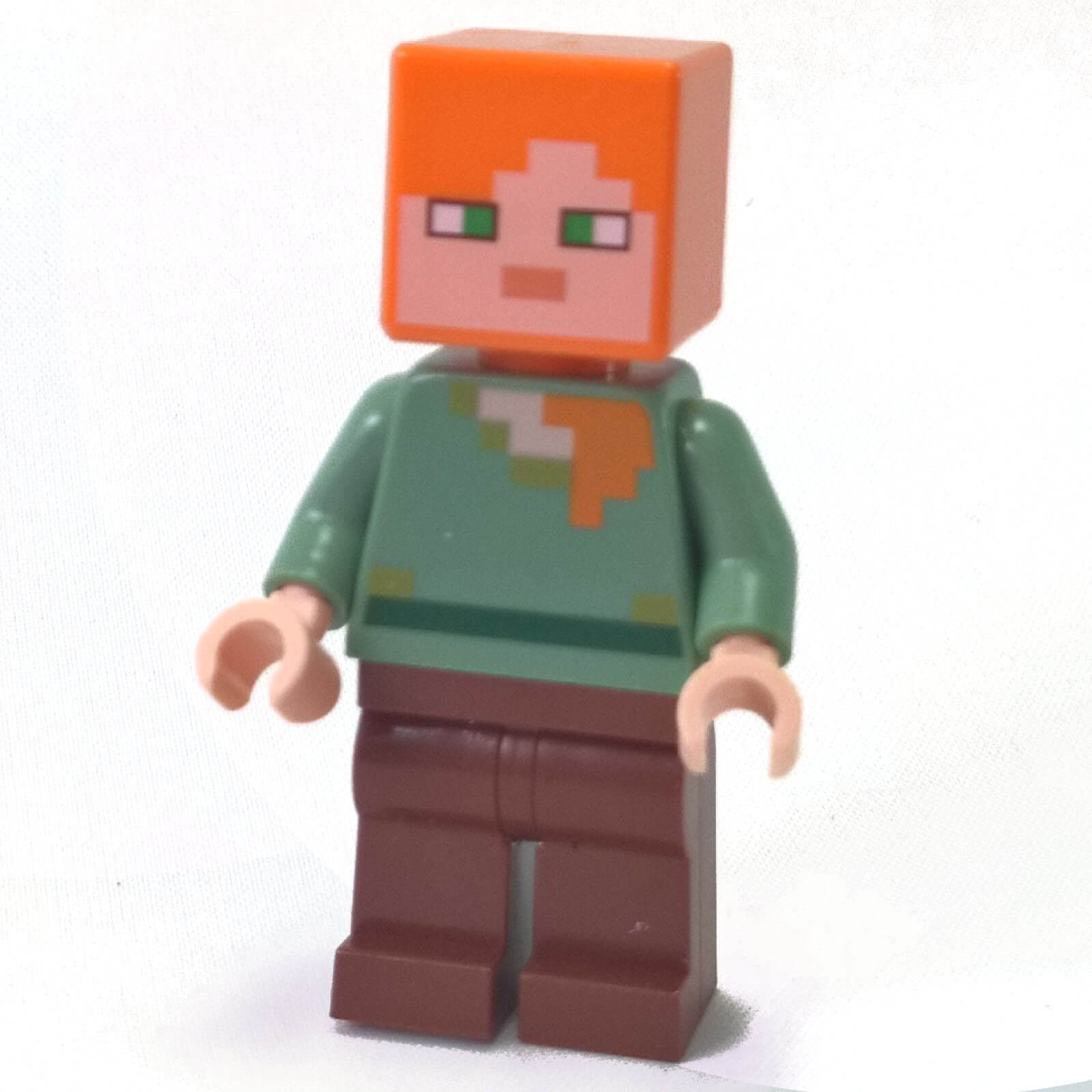 LEGO Alex minifigure min017 with green torso and reddish brown legs
