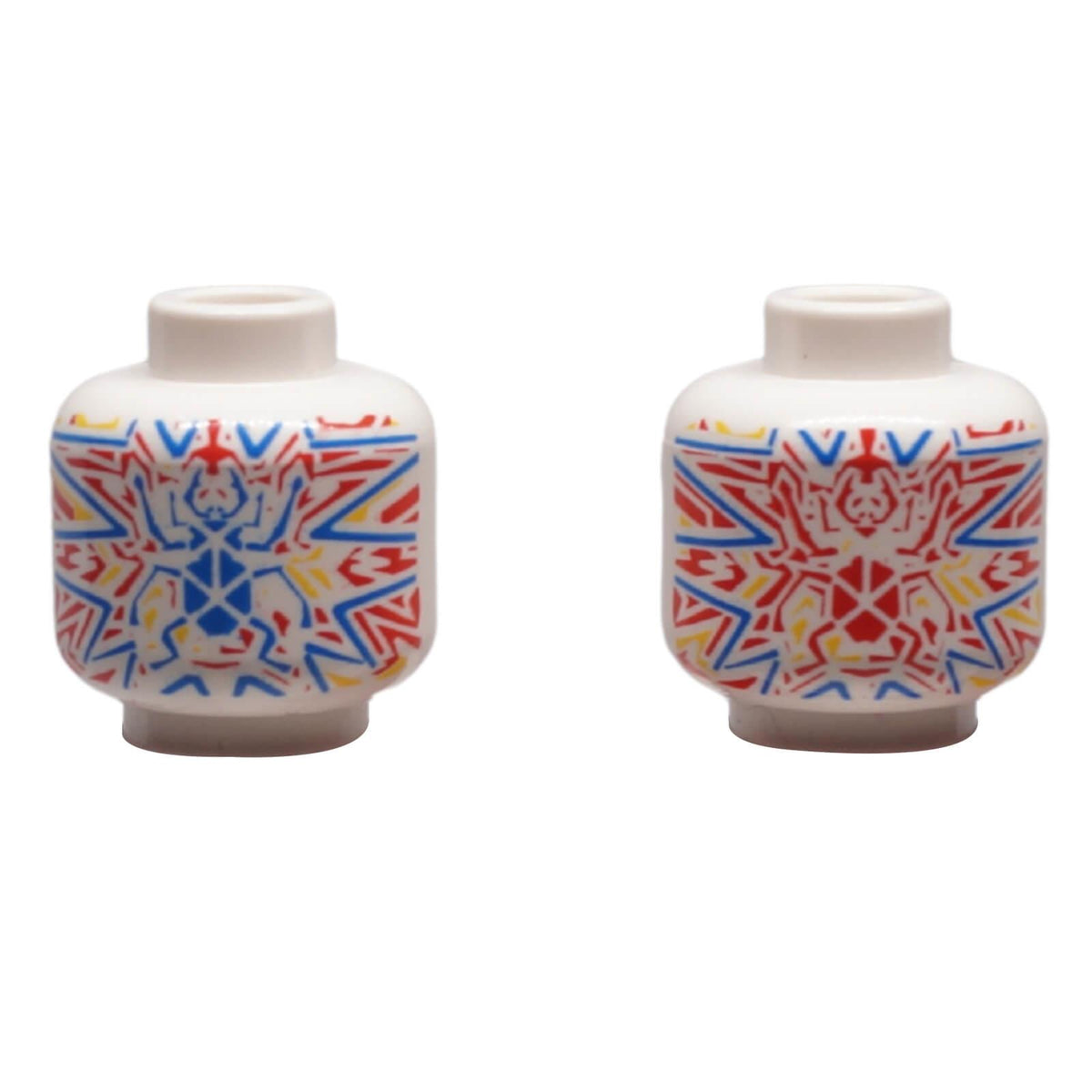 White LEGO® Alpha Team head 3626pb0091 with red, blue and yellow Ogel Orb pattern shown from two sides