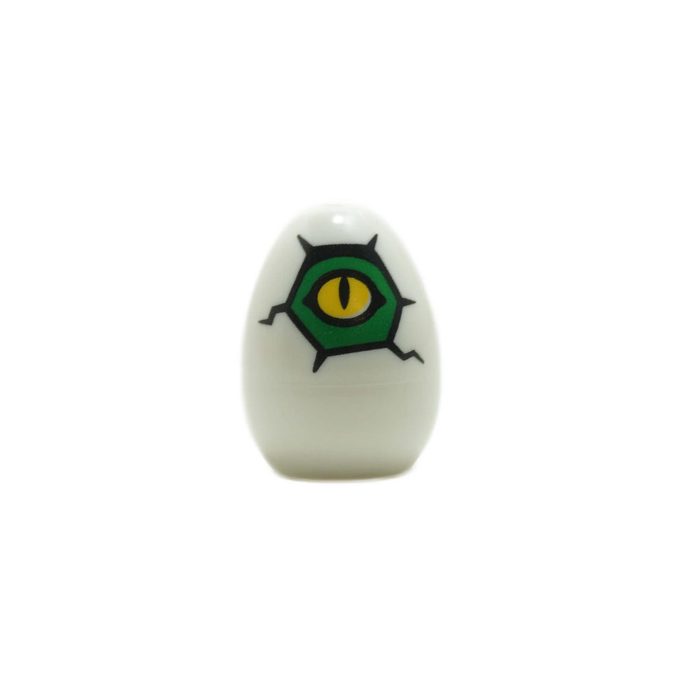 Alb Piesă LEGO ou de dinozaur (24946pb02) cu contur negru crăpat și un print cu ochi reptilieni strălucitori galbeni/verzi.