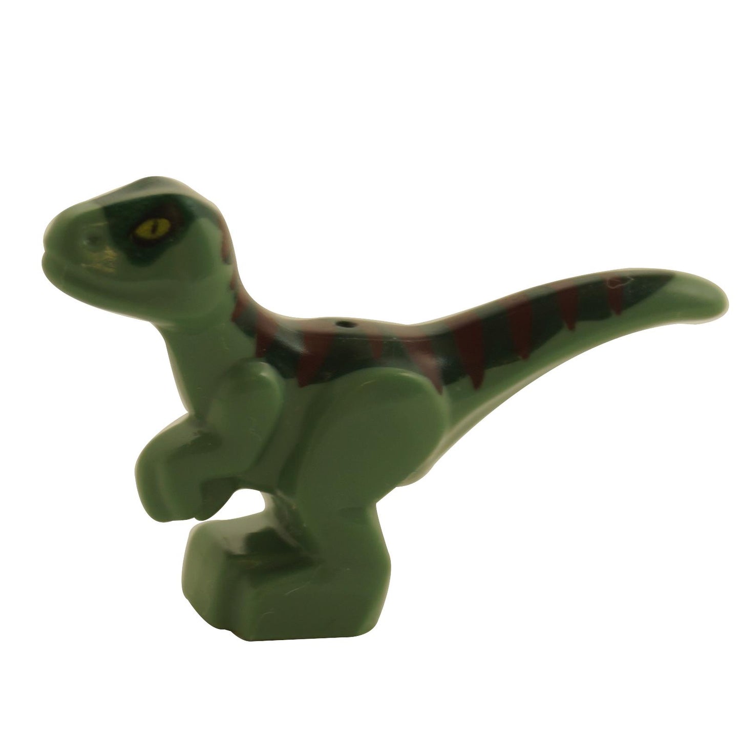 A LEGO mini figure of a dinosaur baby with dark green skin, dark red stripes, and yellow eyes.