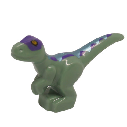 Sand green baby standing dinosaur with dark purple back, metallic blue stripes, and yellow eyes (Part 37829pb11).