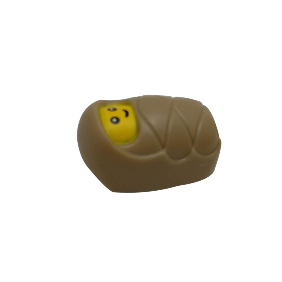 LEGO Baby col339 in tan swaddle, smiling face, side view