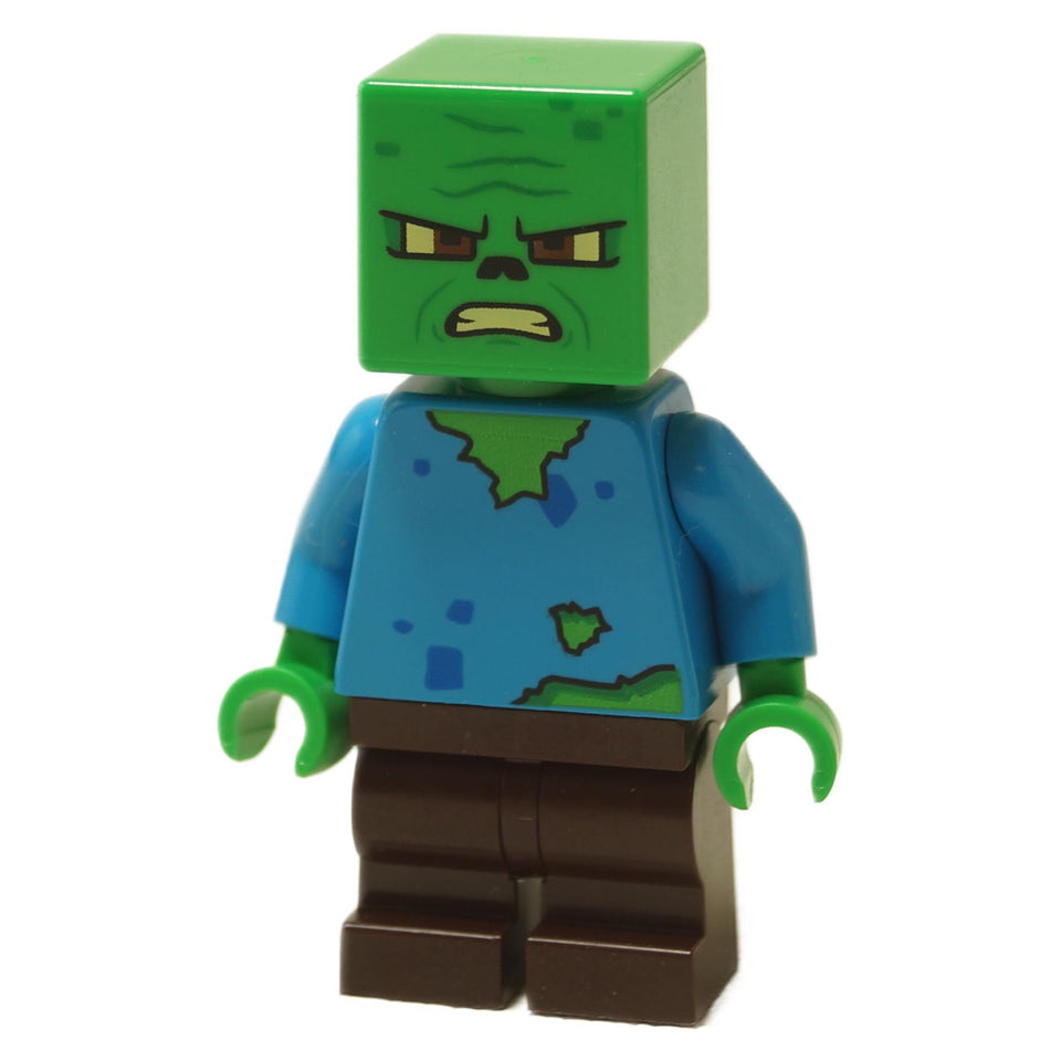 Front view of Baby Zombie LEGO® Minecraft Movie minifigure (min215) from set 21272, featuring green blocky head, angry expression, blue torn shirt, and dark brown legs