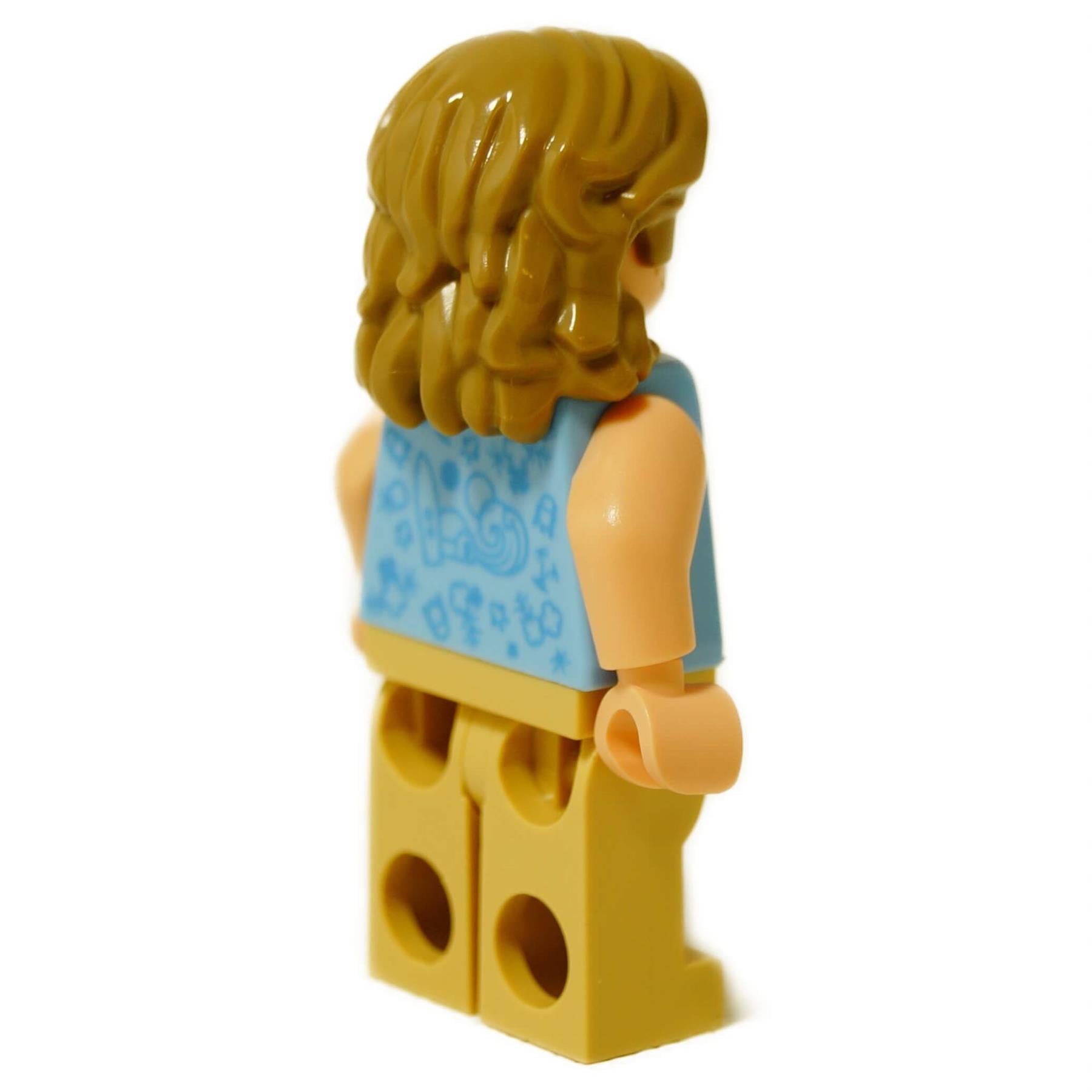 Back view of LEGO Beach Luke minifigure showing long hair and blue tropical shirt print