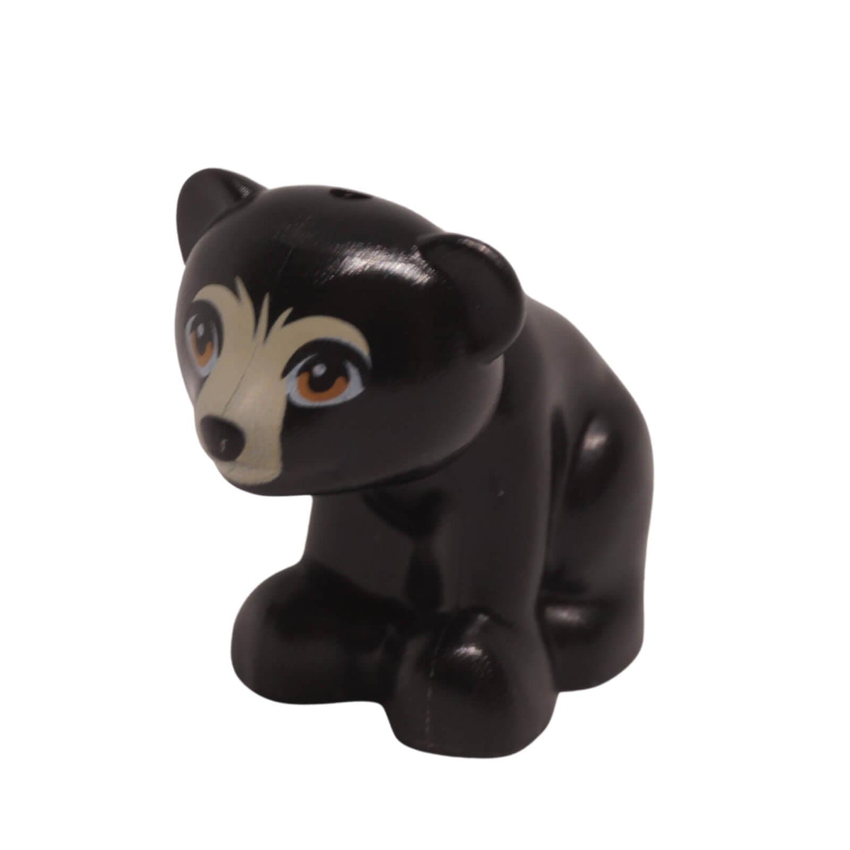 LEGO black baby bear cub figure in a sitting pose with a tan muzzle and nougat eyes (Part 14732pb05).