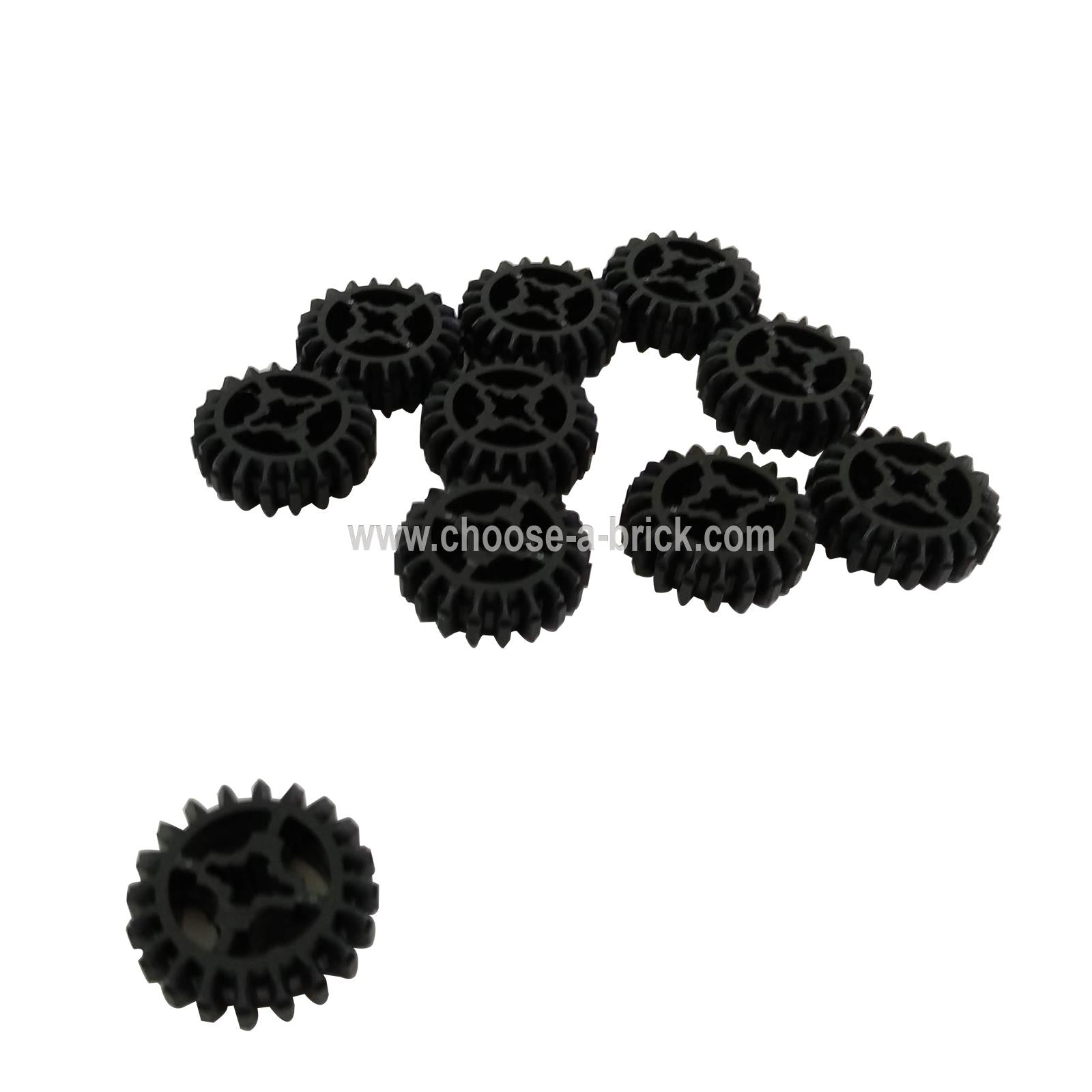Un grupo de diez engranajes de doble bisel de 20 dientes LEGO Technic (32269) esparcidos sobre un fondo blanco.