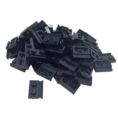 Black modified Plate 1 x 2 with door rail for sliding doors, track guides, and compact wall builds
