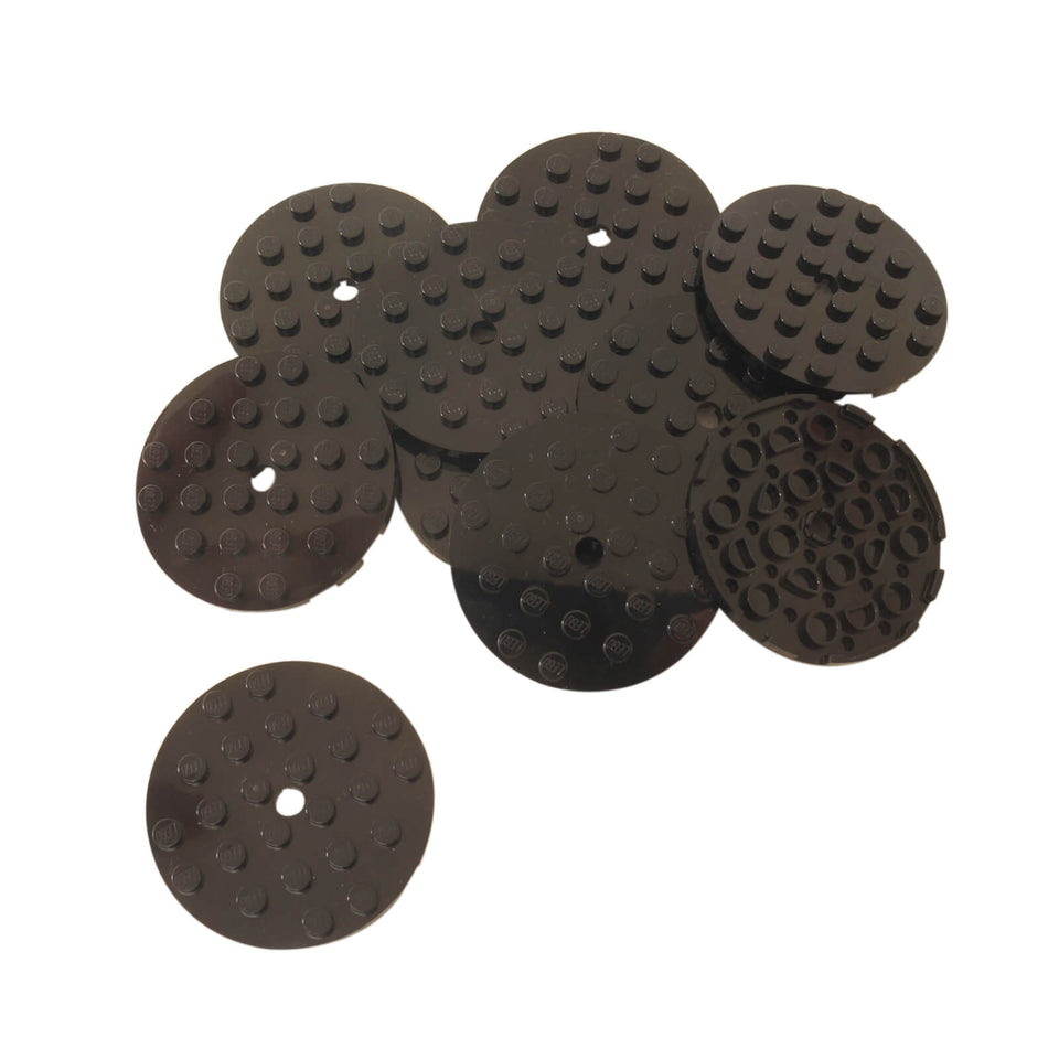Black LEGO® Round Plate 6 x 6 part 11213 shown from the top and underside with studs and a central hole