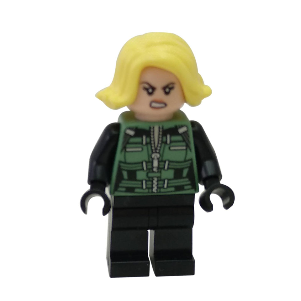 A LEGO® minifigure of Black Widow with a light nougat head featuring an angry or determined expression, bright light yellow short wavy hair, a black torso with green tactical vest printing, black arms, black hands, and black legs, standing against a white background.