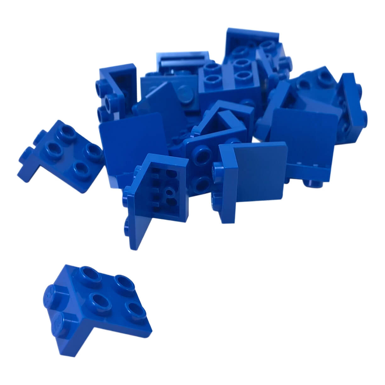 Group of blue LEGO Bracket 1x2 - 2x2 pieces (44728) scattered on a white background.