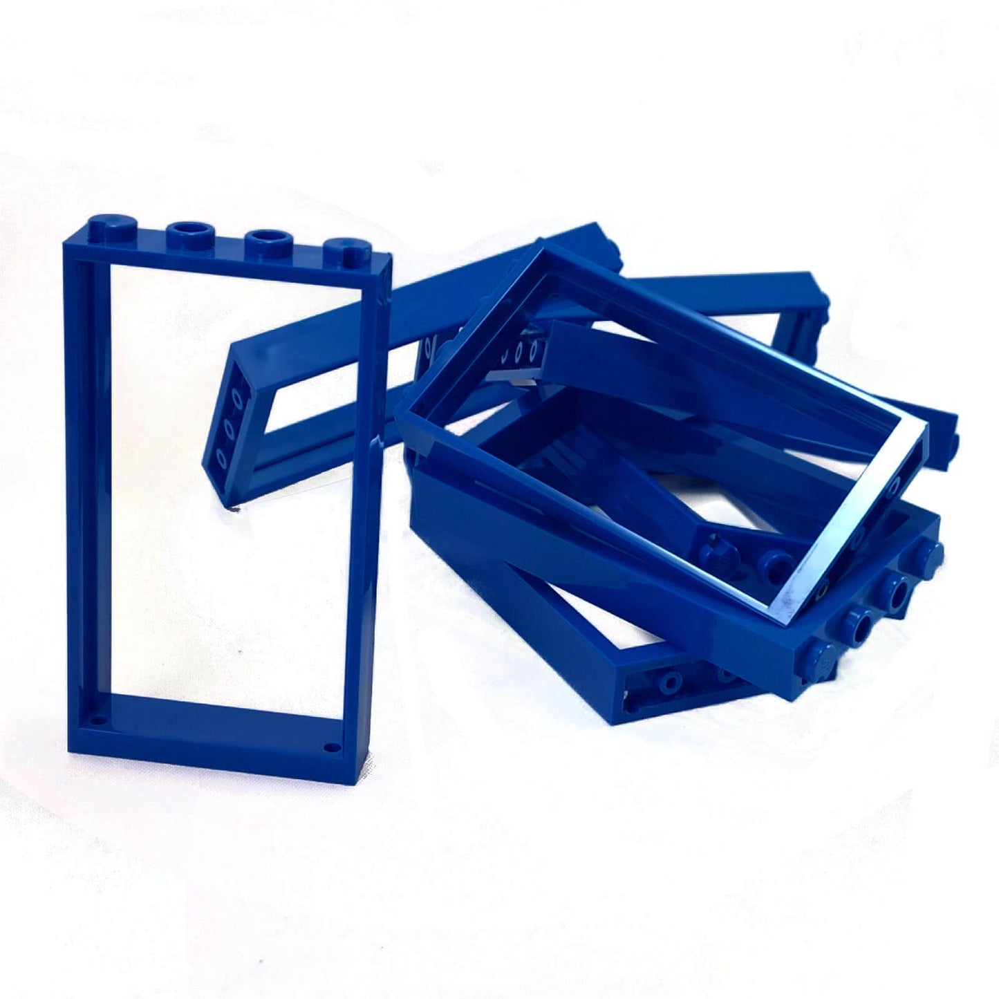 Group of blue LEGO Door Frame 1x4x6 Type 2 pieces (60596) scattered on white background.