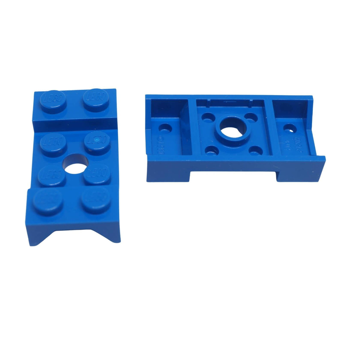 Blue LEGO® vehicle mudguard part 60212 shown top and underside with studded mounting surface, central hole and moulded wheel arch