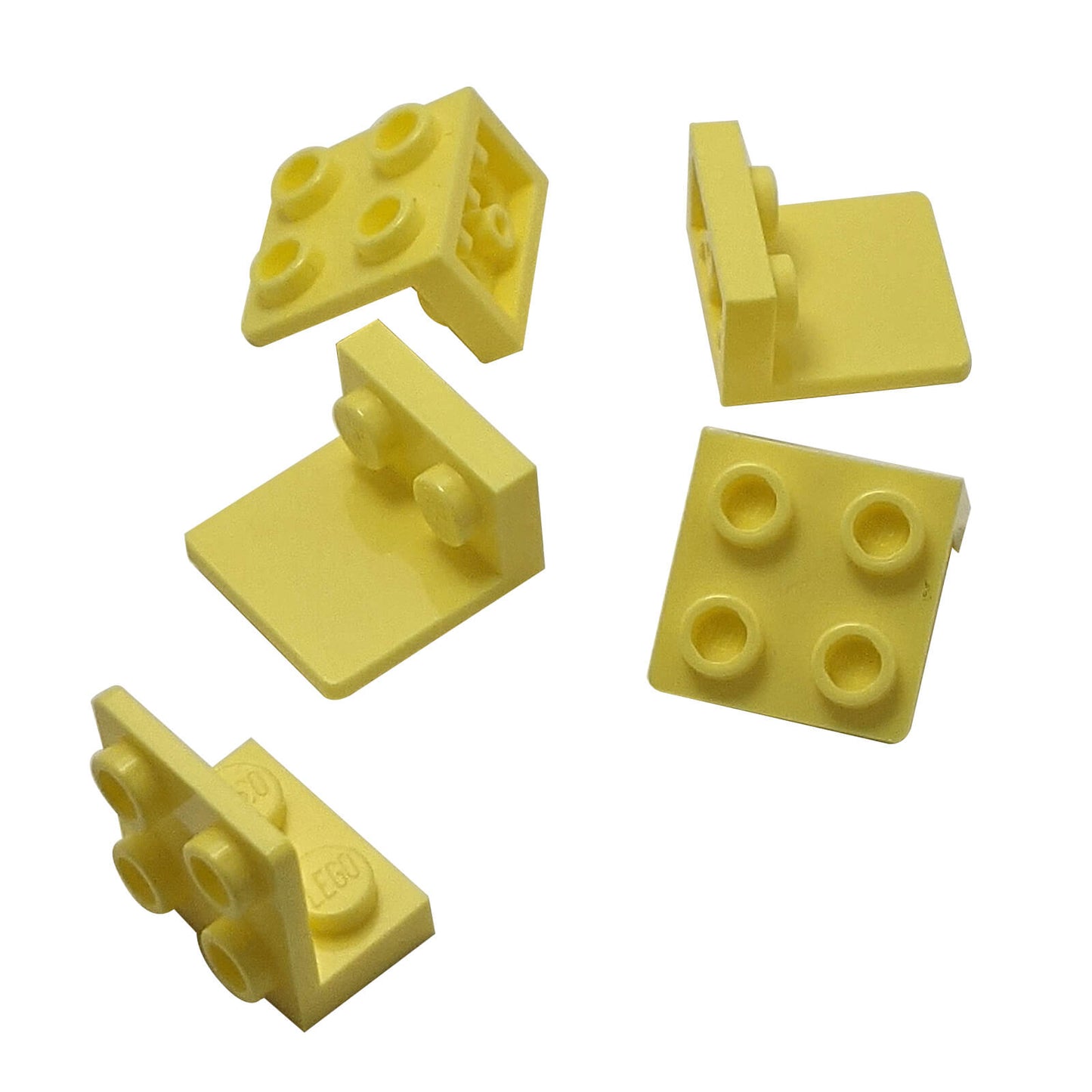 Bright light yellow inverted bracket 1 x 2 - 2 x 2 (part 99207) for offset building and SNOT connections
