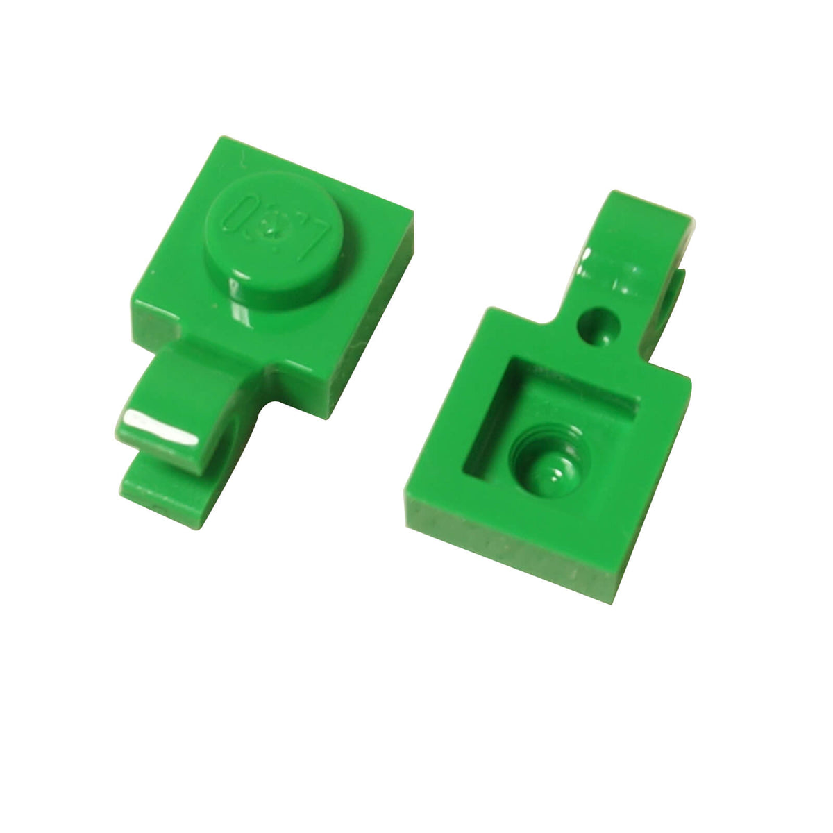 Bright green LEGO® modified plate 1 x 1 part 61252 shown from two angles with single stud and open horizontal O clip