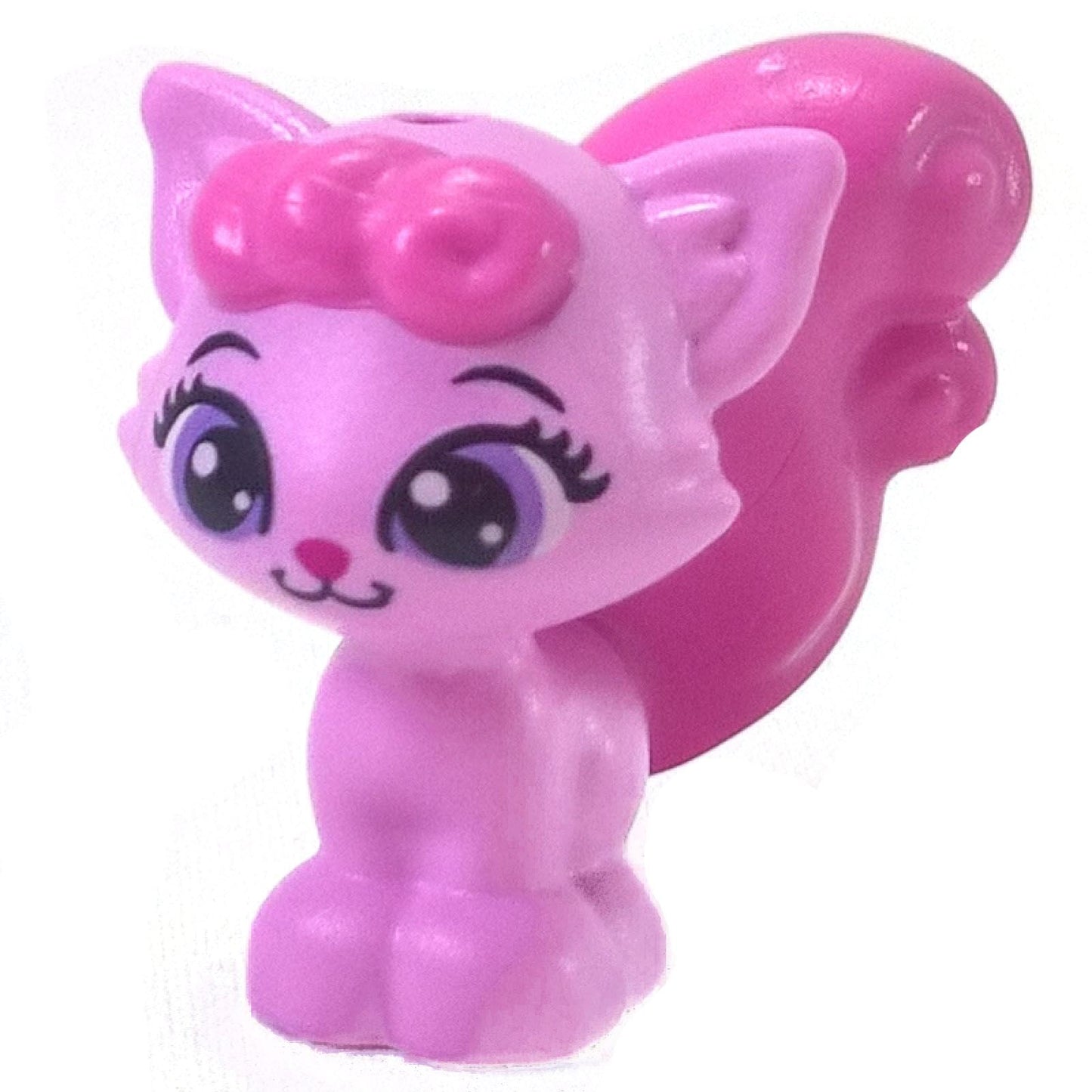 Bright pink kitten with dark pink tail and medium lavender eyes sitting front view
