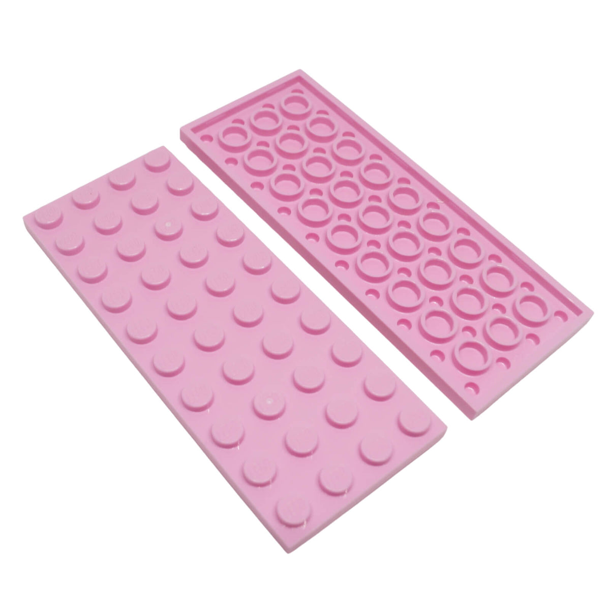 Bright pink LEGO® Plate 4 x 10 part 3030 shown from the top and underside with 40 studs and circular reinforcement tubes