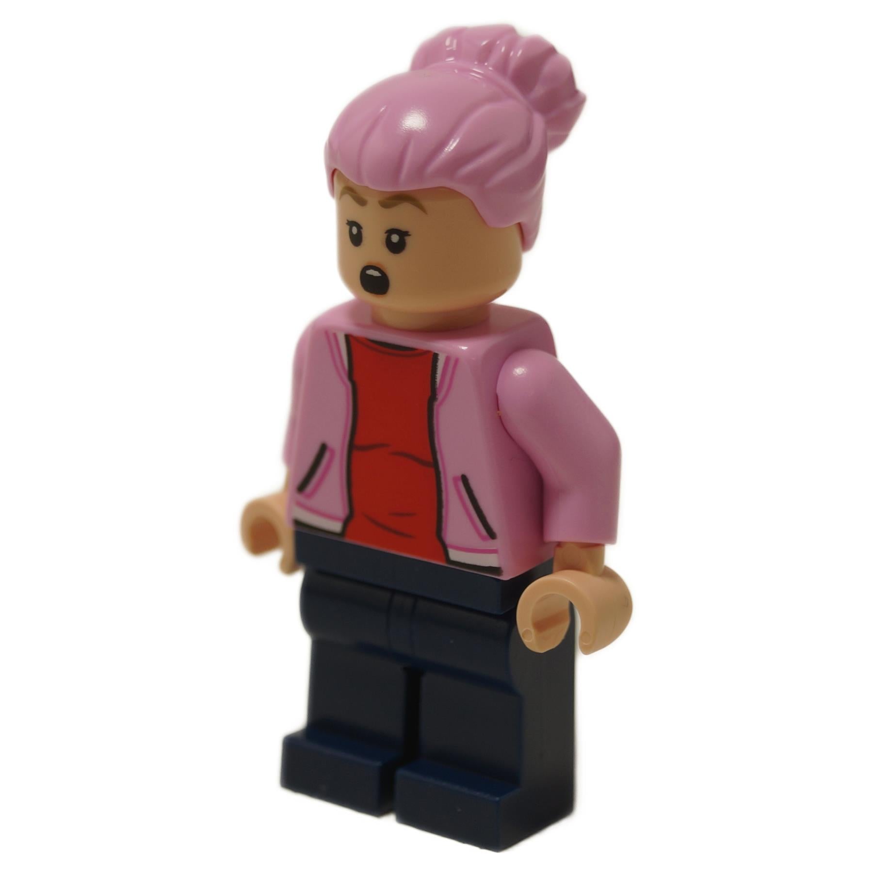 Brooklynn minifigure with surprised open-mouth expression, pink hair bun, pink jacket, red shirt and dark blue legs. Side angled profile view.
