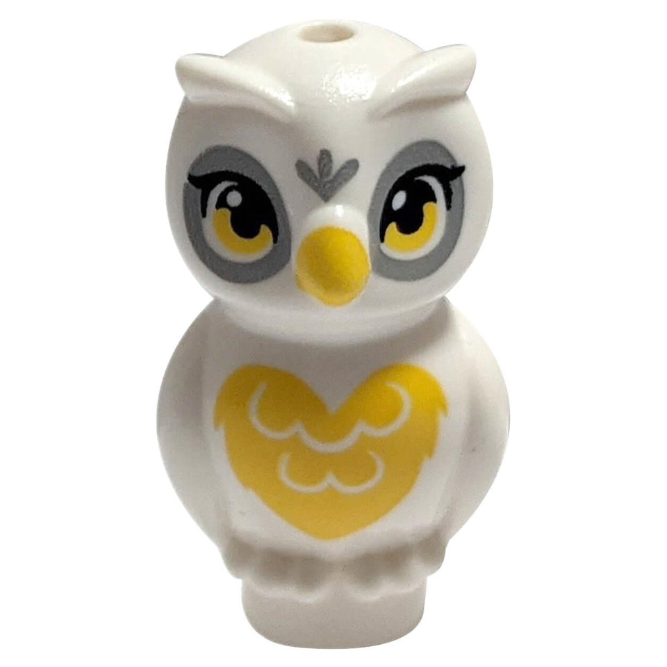 Front view of the LEGO® stylized owl figure (21333pb05) featuring a white body, yellow beak, grey eye markings, and a yellow heart-shaped chest pattern.