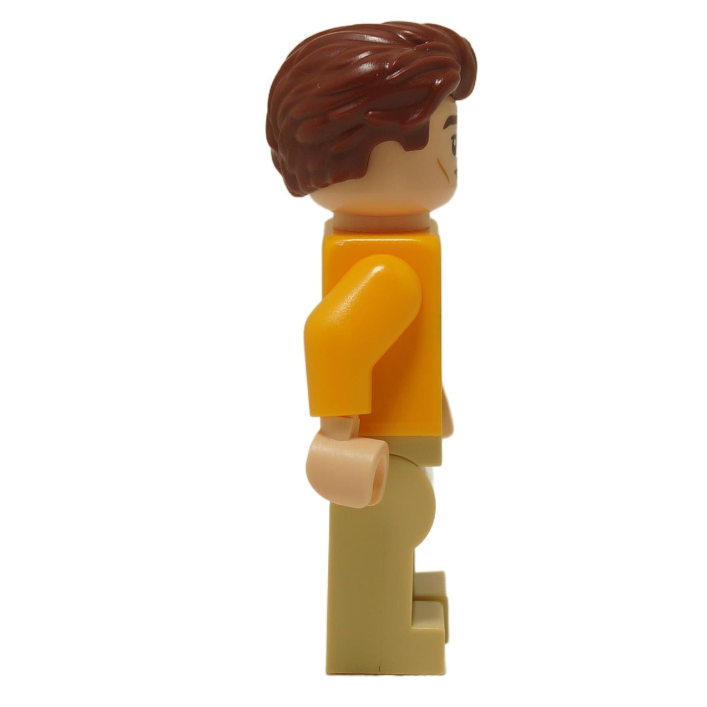 Side view of LEGO Cedric Diggory minifigure hp405 wearing yellow Quidditch sweater and tan legs
