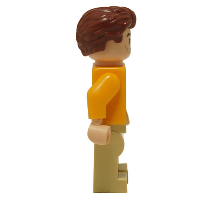 Side view of LEGO Cedric Diggory minifigure hp405 wearing yellow Quidditch sweater and tan legs