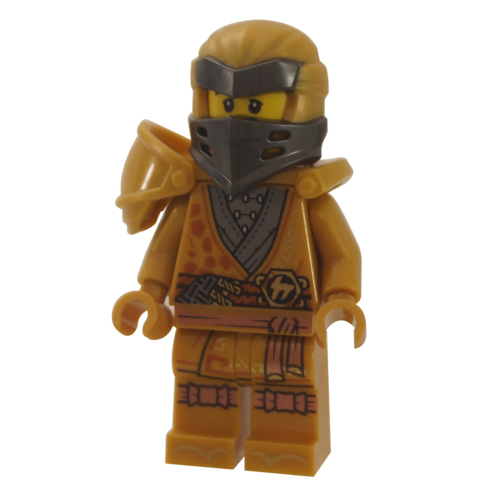 LEGO Golden Ninja Cole minifigure with a dark grey mask, gold armor, and printed robes from the NINJAGO series, celebrating a 10th anniversary.