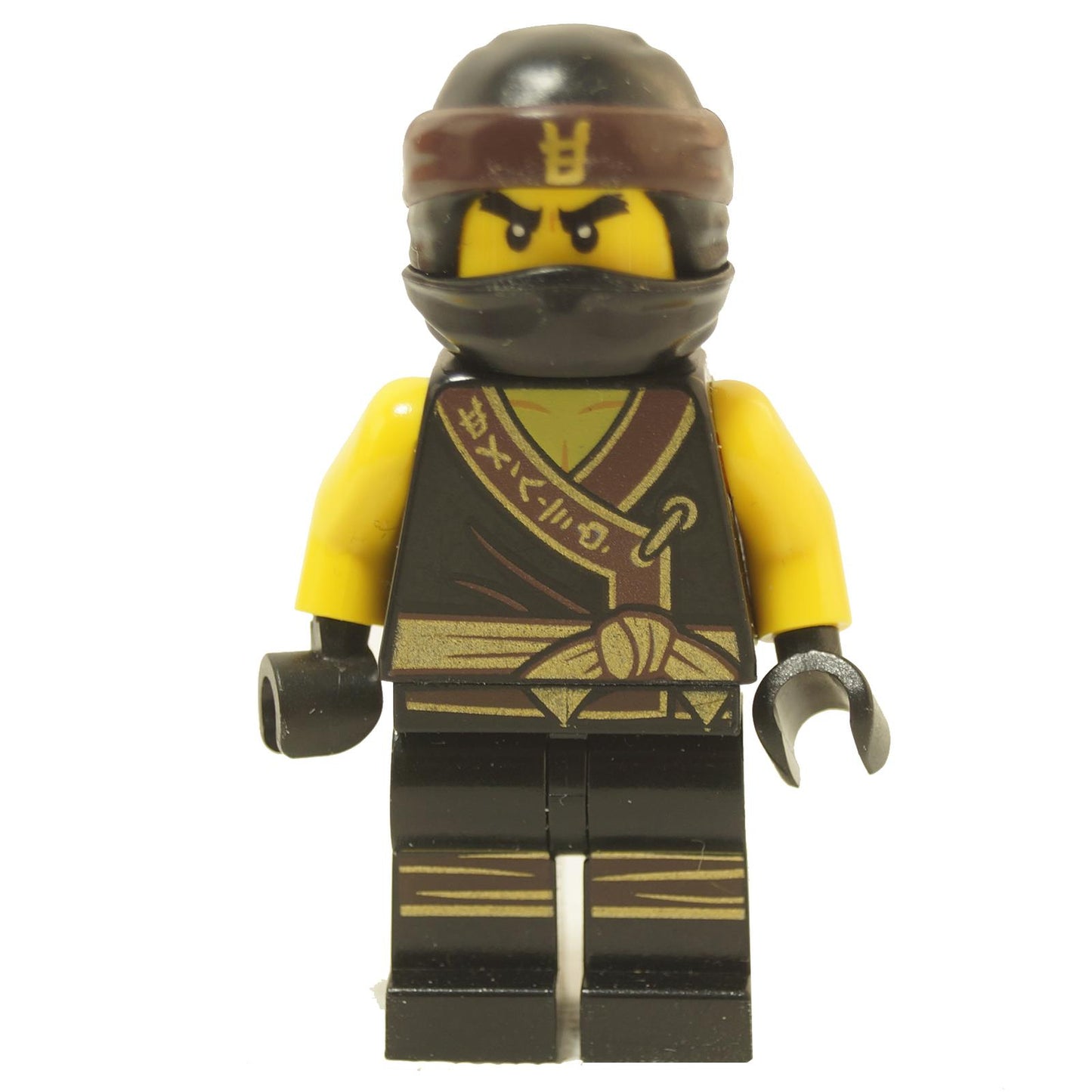 LEGO minifigure of Cole from The LEGO Ninjago Movie, featuring a black and gold ninja outfit with a brown headband and black face wrap.