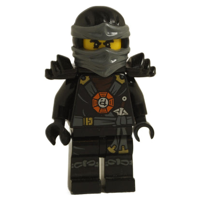 LEGO minifigure of a ninja character with black armor and a round emblem on the chest, wearing a dark gray ninja mask.
