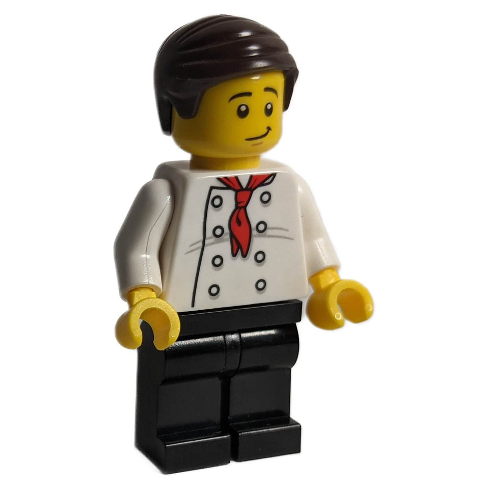 LEGO minifigure representing a burger chef with a red neckerchief and chef's attire.