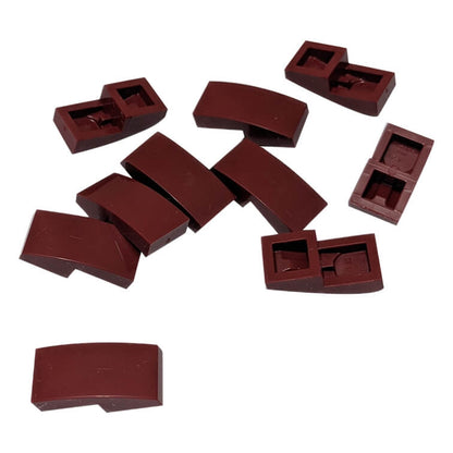 LEGO Curved Slope 2 x 1 x 2/3 part 11477 shown from top and underside dark red