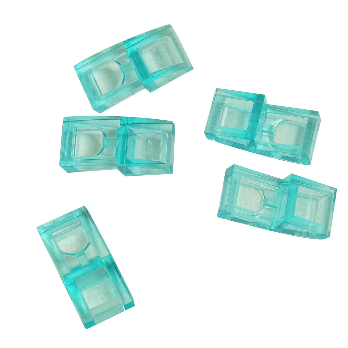 LEGO Curved Slope 2 x 1 x 2/3 part 11477 shown from top and underside trans-light-blue