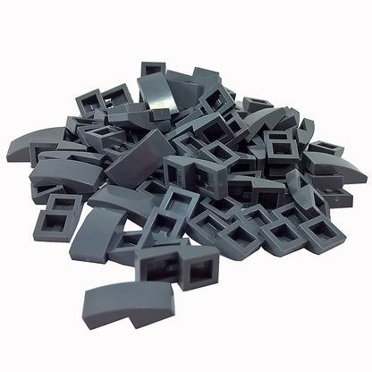 LEGO Curved Slope 2 x 1 x 2/3 part 11477 shown from top and underside dark bluish gray