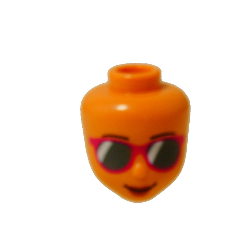 LEGO Friends mini-doll head (72409) with pink sunglasses and a smiling mouth.