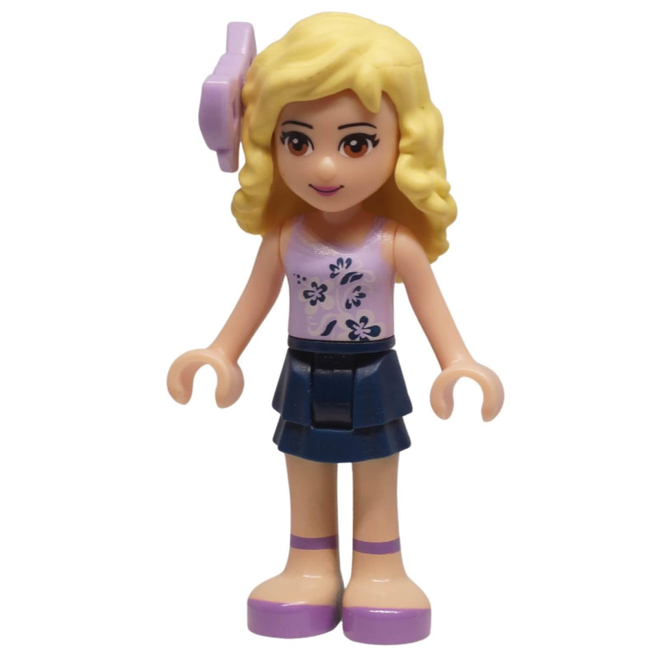 LEGO Friends Danielle mini-doll frnd0049 with lavender floral top, layered skirt, and bow hairpiece. From Downtown Bakery set, ideal for collections.