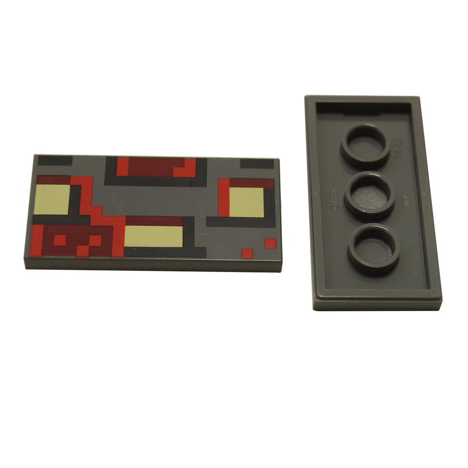 A dark bluish gray 2x4 LEGO tile with a pixelated pattern featuring black, bright light yellow, dark red, and red colors representing the Redstone Monstrosity face from Minecraft.