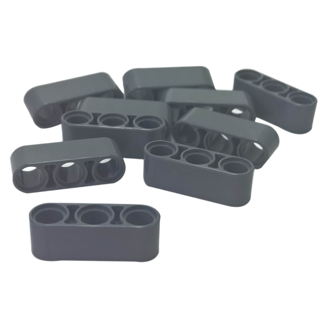 Pile of dark bluish-gray LEGO Technic 1x3 Thick Liftarm pieces (32523) shown in various orientations.