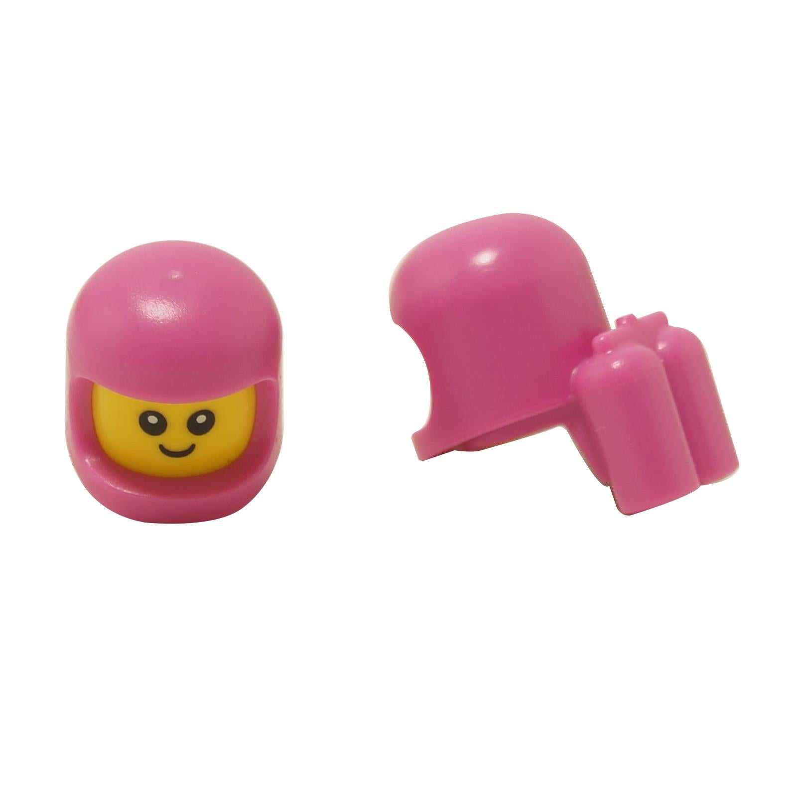 Cabeza de minifigura para bebé o niño pequeño con casco espacial moldeado de color rosa oscuro y tanques de aire, cara sonriente, mostrada de frente y de lado
