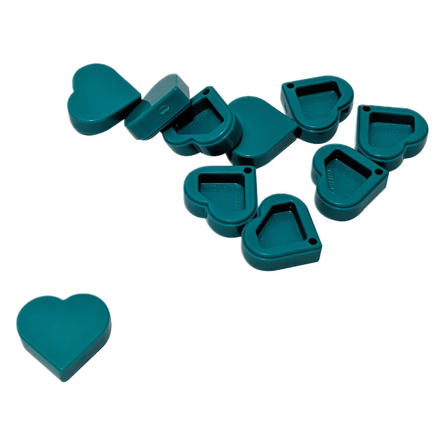 Group of dark turquoise LEGO Tile, Round 1x1 Heart pieces (39739) showing various orientations.