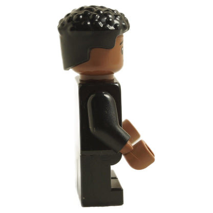 Side view of LEGO Dean Thomas minifigure hp471 wearing Hogwarts robe with short curly hair