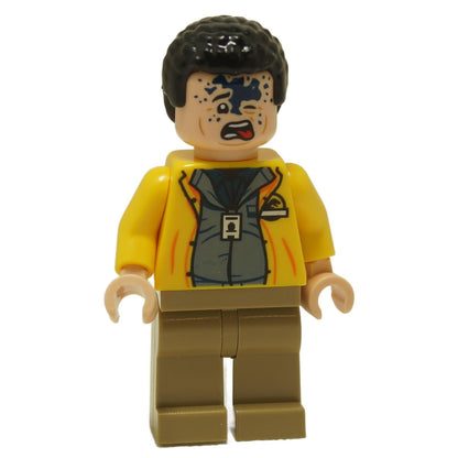 LEGO® Jurassic World Dennis Nedry minifigure jw106 with yellow jacket, dark blue undershirt, and poisoned facial expression with black venom spots
