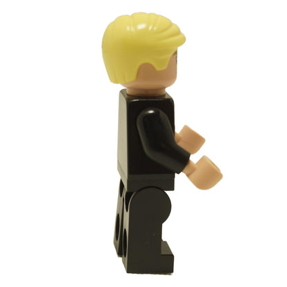 Side view of LEGO Draco Malfoy minifigure wearing black Slytherin robe with blonde hair