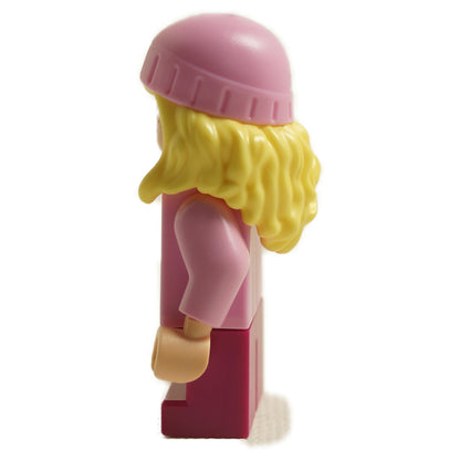 Side view of LEGO Edith minifigure mnn025 with blonde hair, pink hat and pink striped sweater