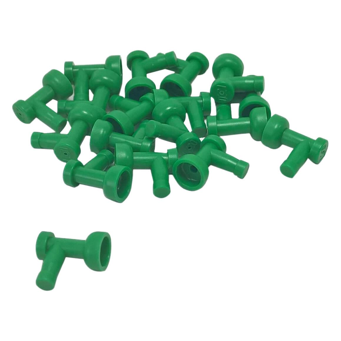 A pile of numerous bright green LEGO Part 4599b (Tap 1 x 1 without Hole in End) pieces scattered against a white background, showing their T-shape with a flared cup end.