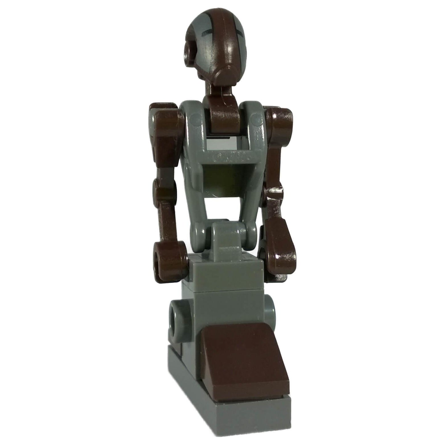 LEGO minifigure of the FA-4 Pilot Droid from the Star Wars universe, featuring a gray and brown color scheme, sitting in a chair.
