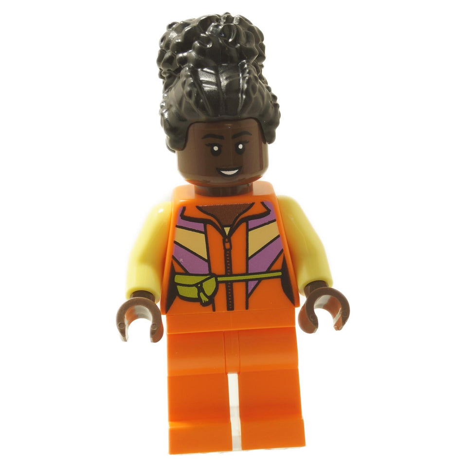 LEGO® Película de Minecraft Minifigura Dawn del set 21273 El Ataque del Globo de Ghast, vistiendo una chaqueta naranja y morada.