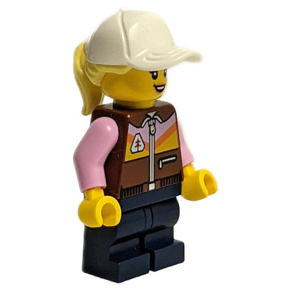 Female Dirt Bike Rider with White Cap and Ponytail