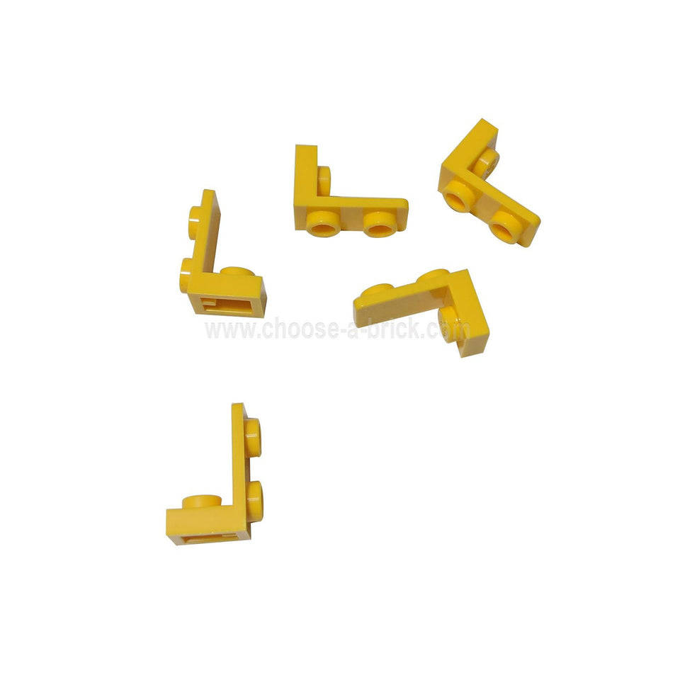 Five yellow LEGO Bracket 1 x 1 - 1 x 2 Inverted pieces from multiple angles.