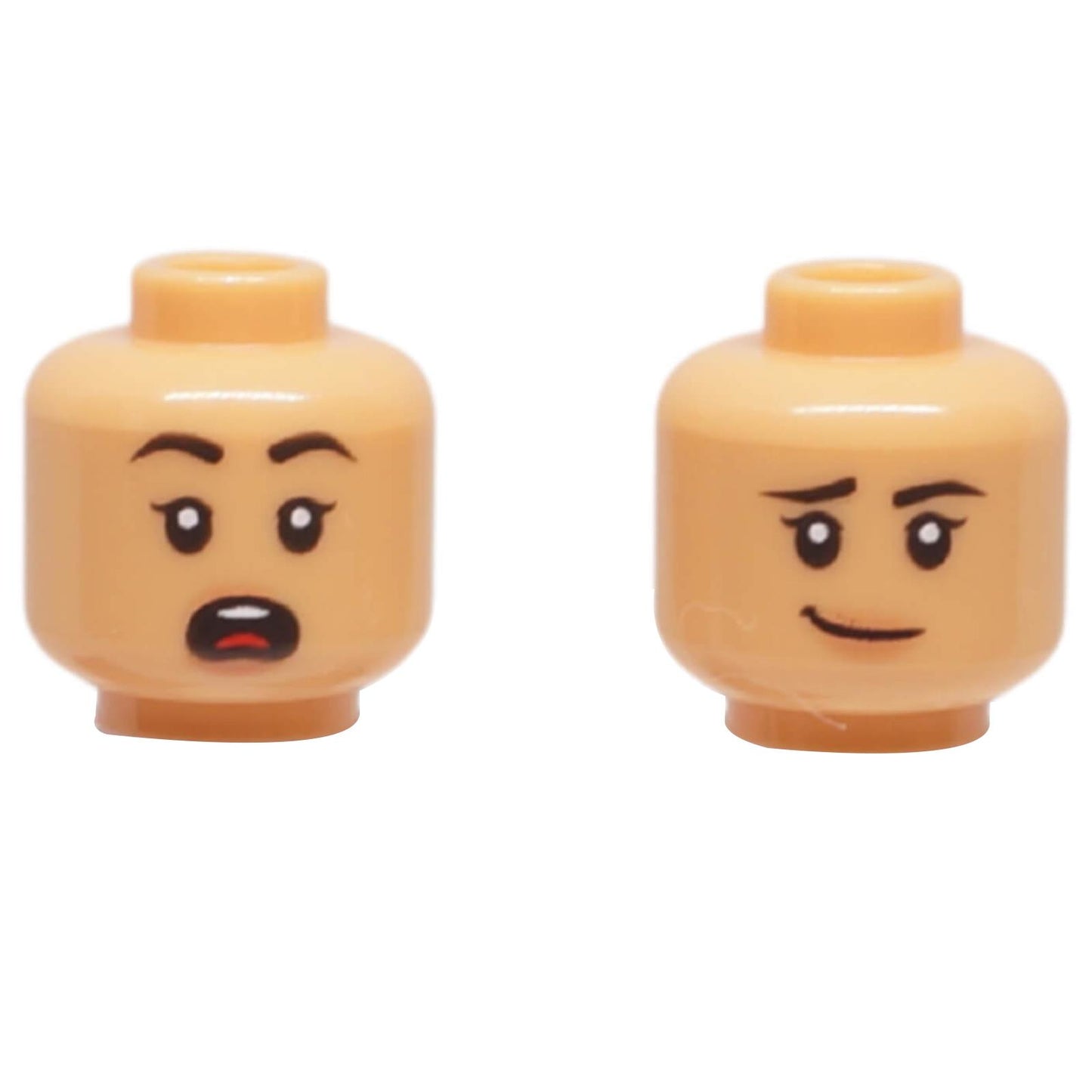 LEGO female minifigure head with dual-sided printing: a lopsided smirk and a surprised, shocked expression.