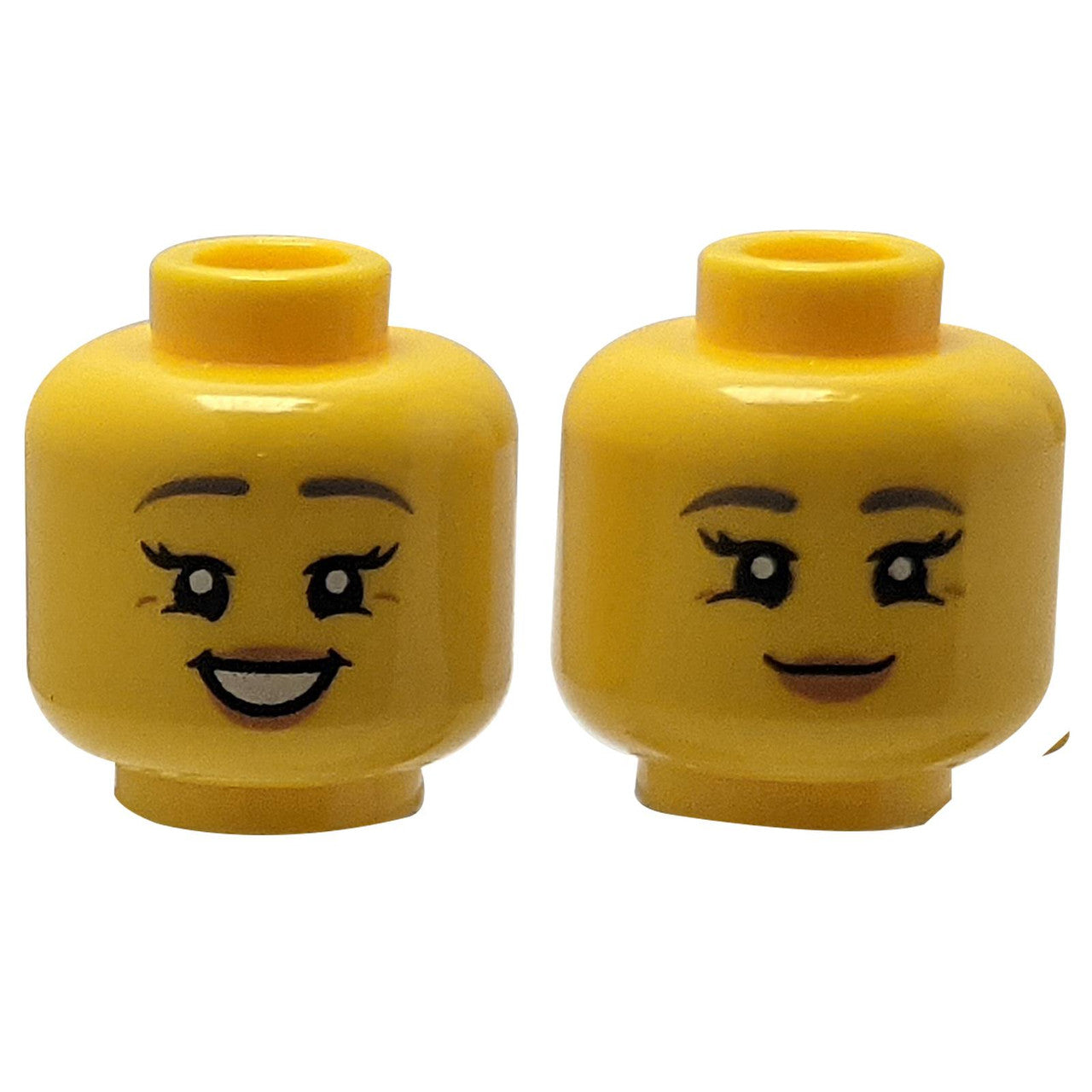 LEGO® female dual-sided minifigure head with two smiling expressions and medium nougat lips